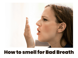 Picture of woman showing how to smell for bad breath